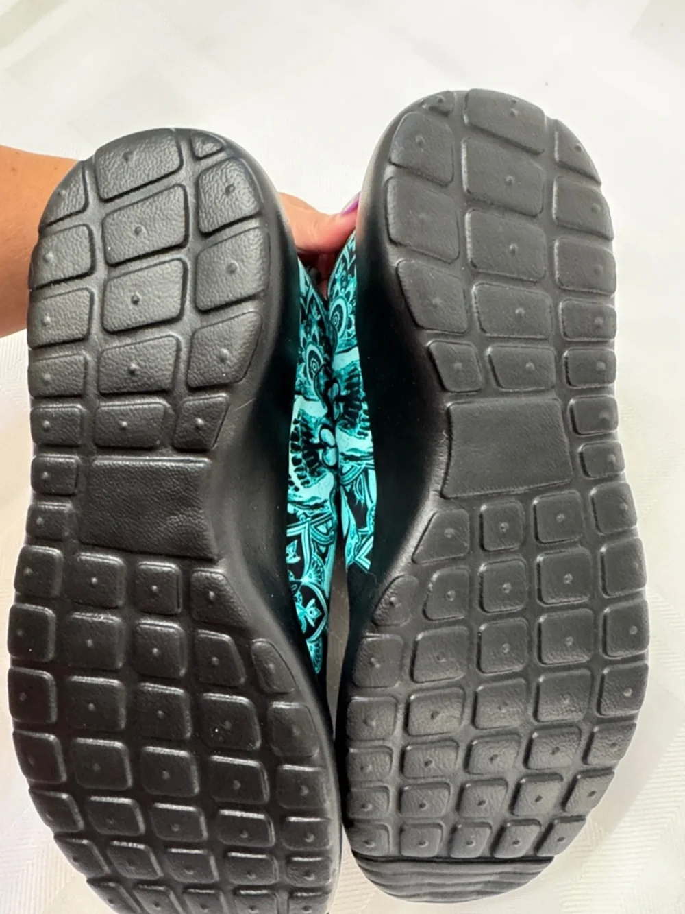 Unisex Black Lightweight Sneakers with Teal Skull Accent